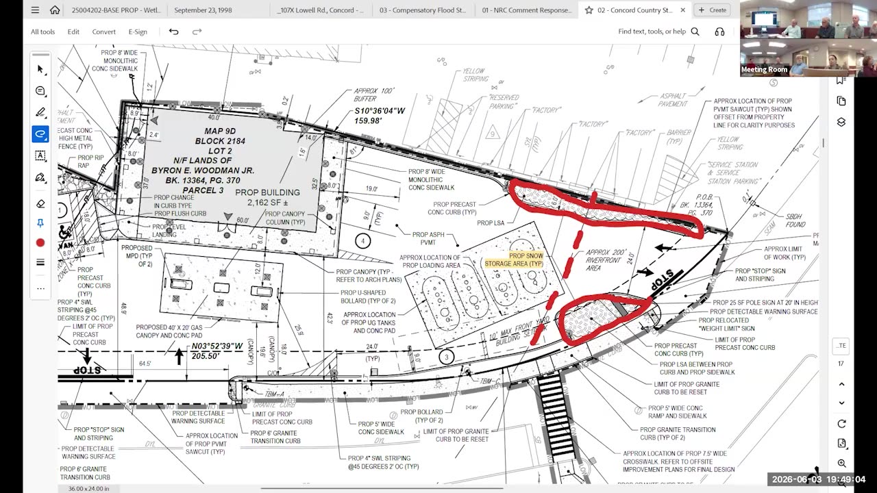 Detailed site plan with proposed building, sidewalks, and red highlights