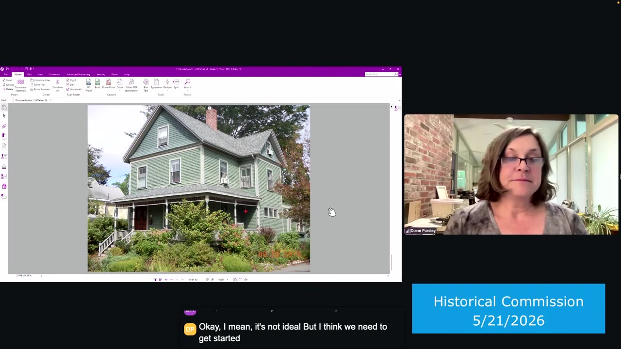 Photo rendering of green two-story house in presentation window
