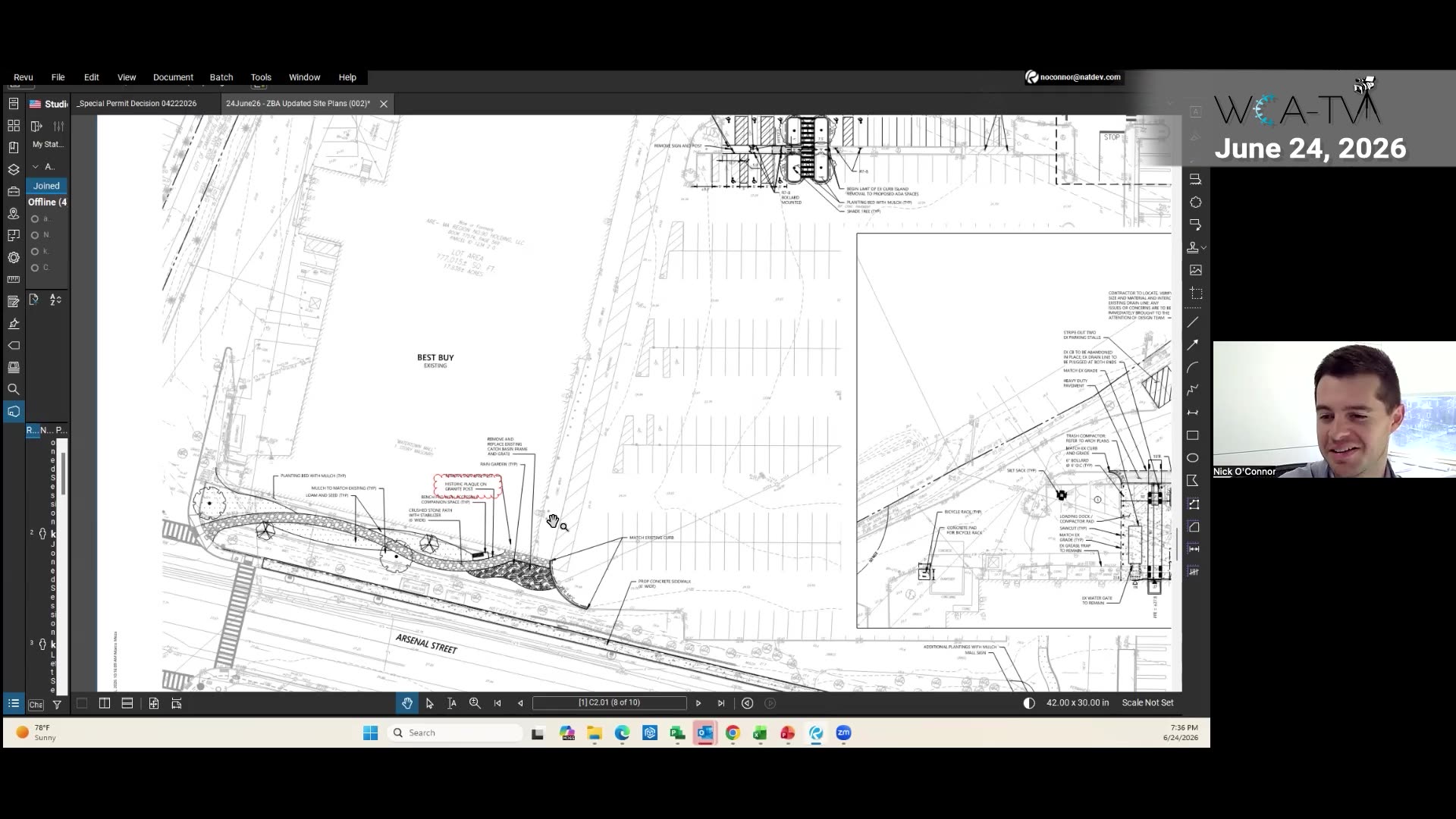 Site plan with labeled bike racks, benches, and historic plaque