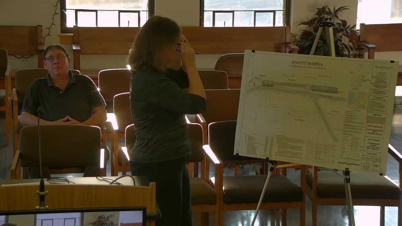 Knotty Marina site plan on easel at public meeting