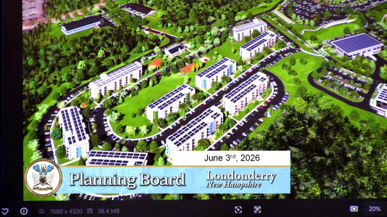 Aerial rendering of proposed multi-building development with parking and landscaping