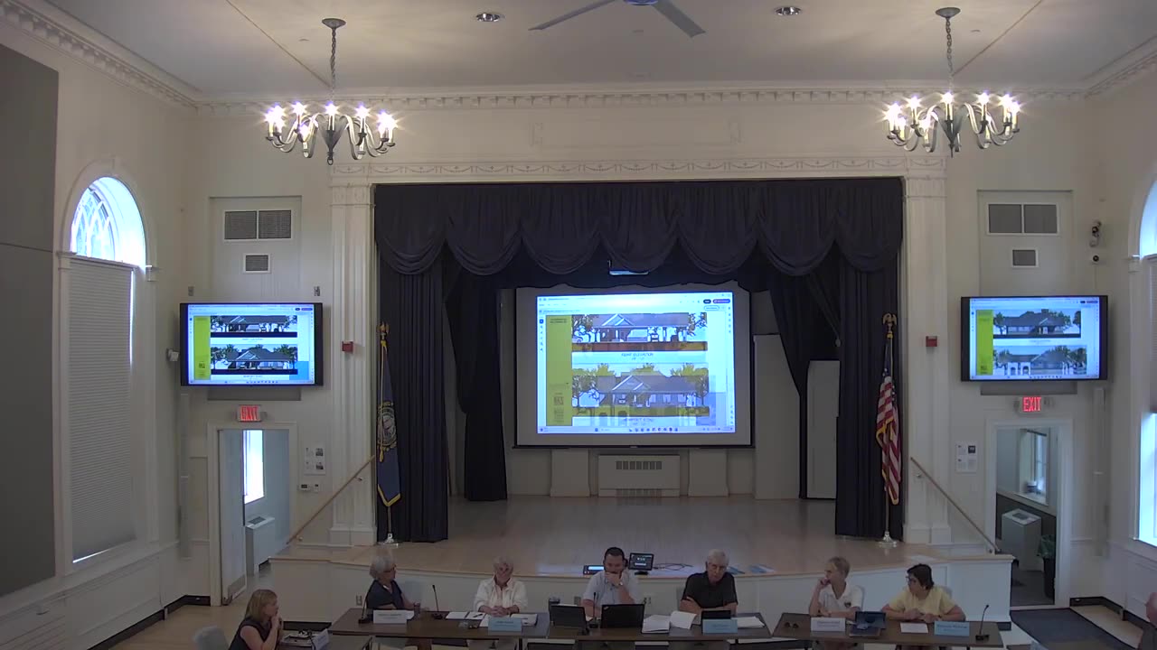 Architectural renderings of building elevations on central screen
