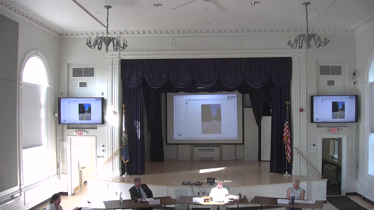 Presentation slide showing road site photo