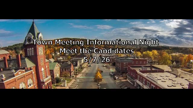 Aerial view of town hall and downtown with meeting overlay text
